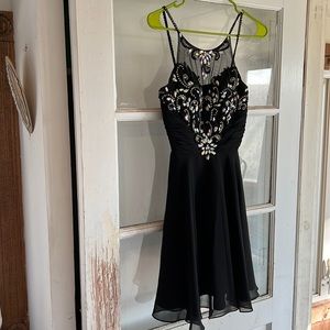 Short black dress with front detailing